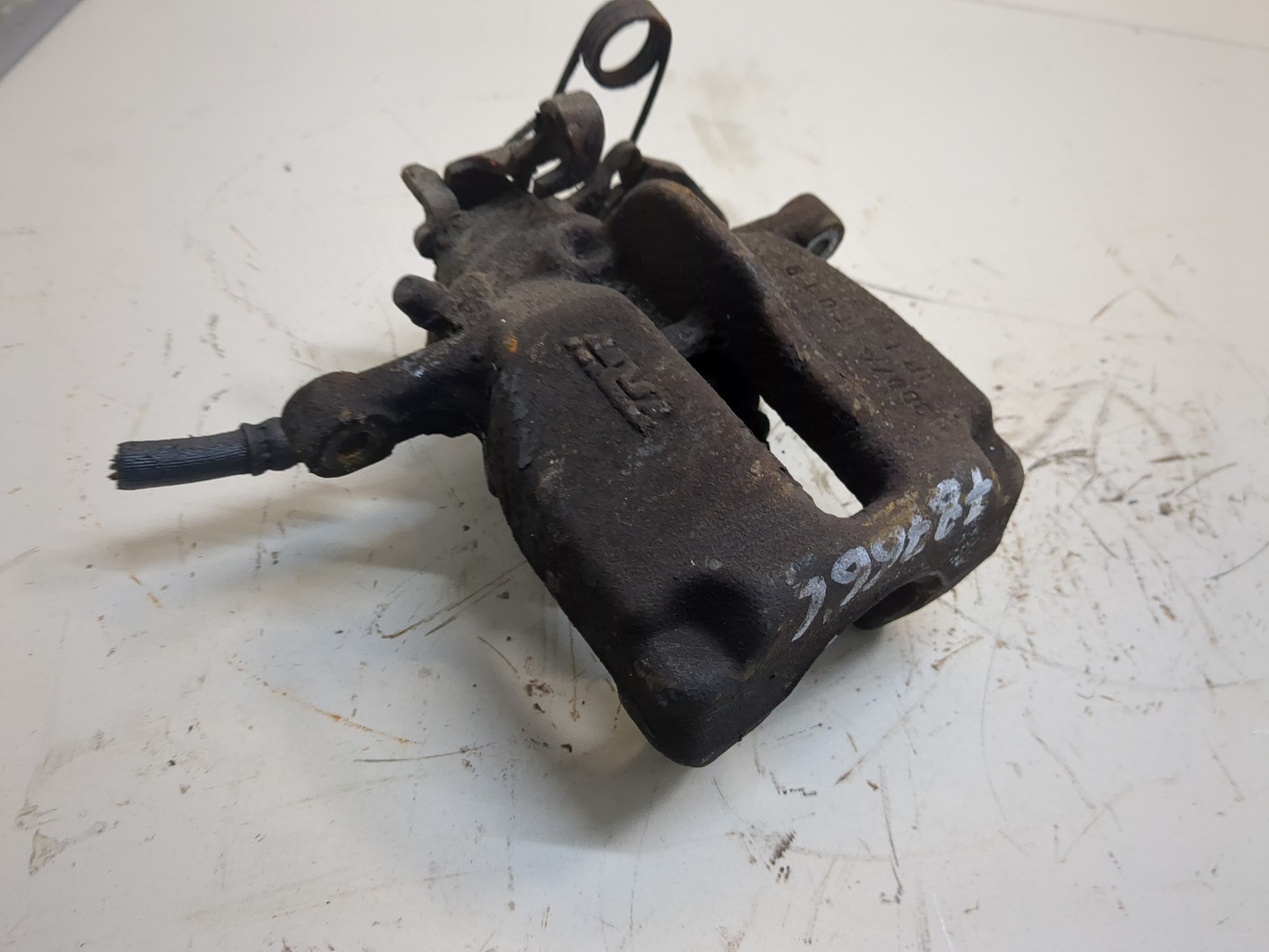 Суппорт задний левый