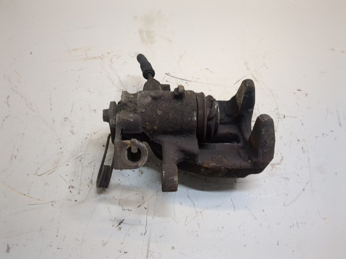 Суппорт задний левый