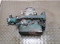  Корпус масляного фильтра Volvo FL 2006-2013 21021744 #1