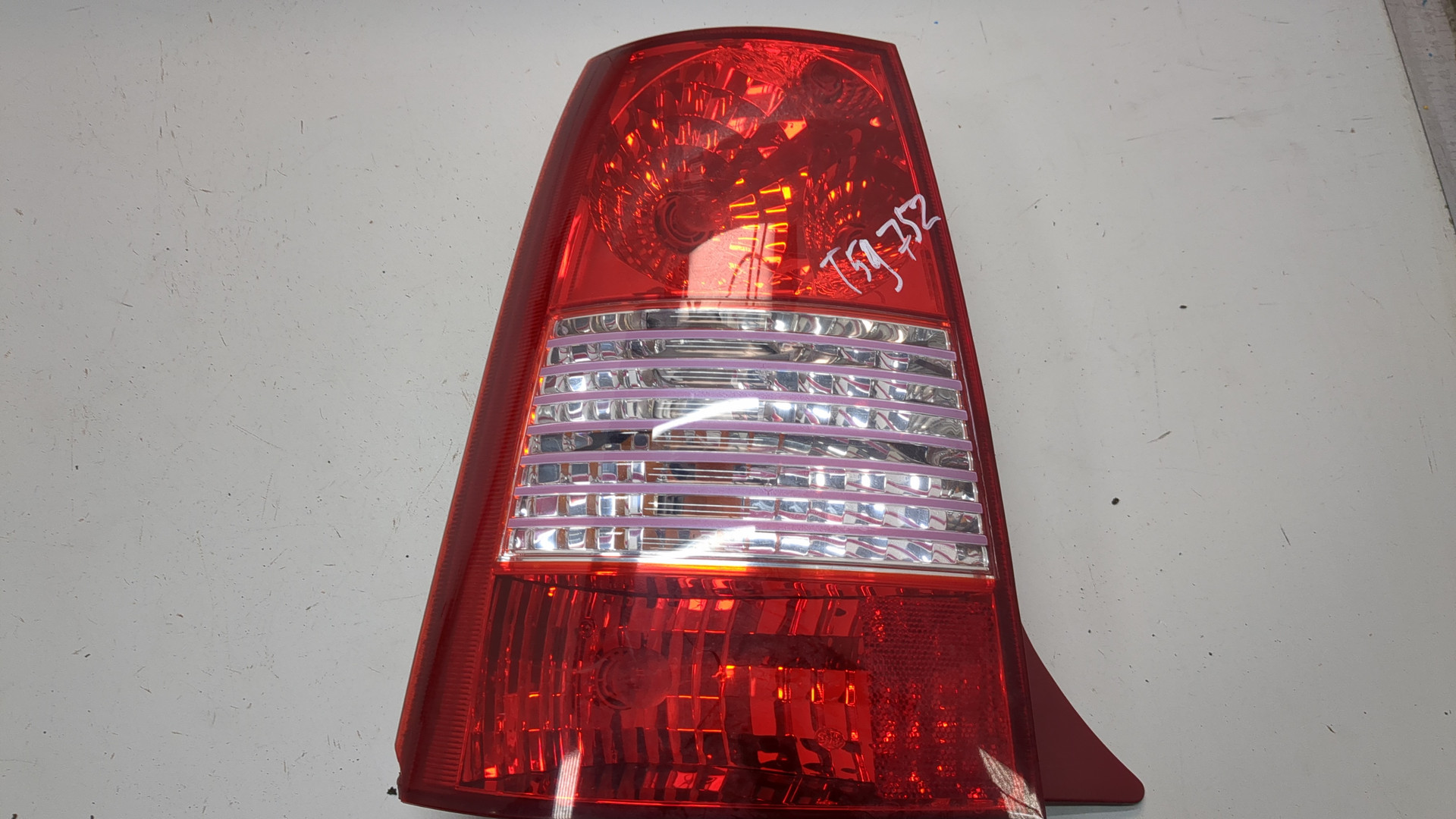 Фонарь задний левый