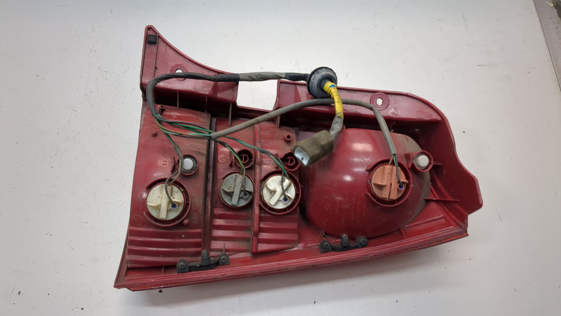 Фонарь задний левый