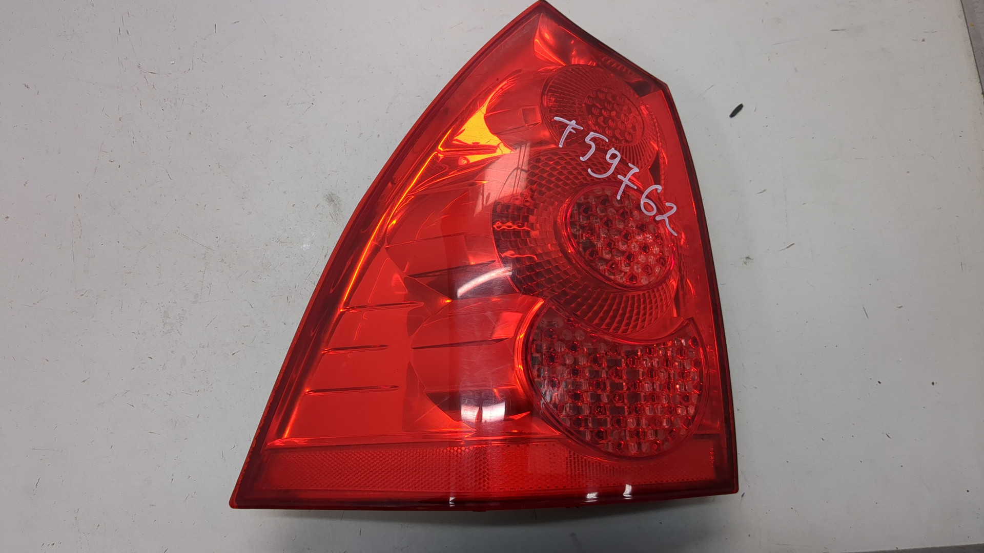 Фонарь задний левый