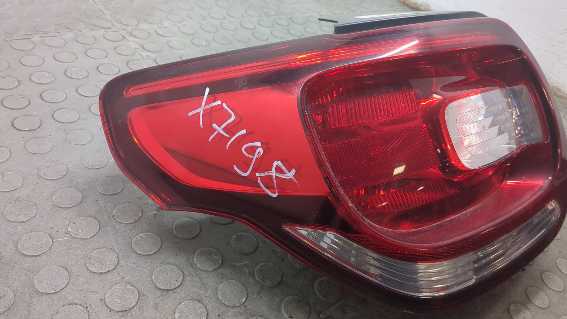 Фонарь задний левый