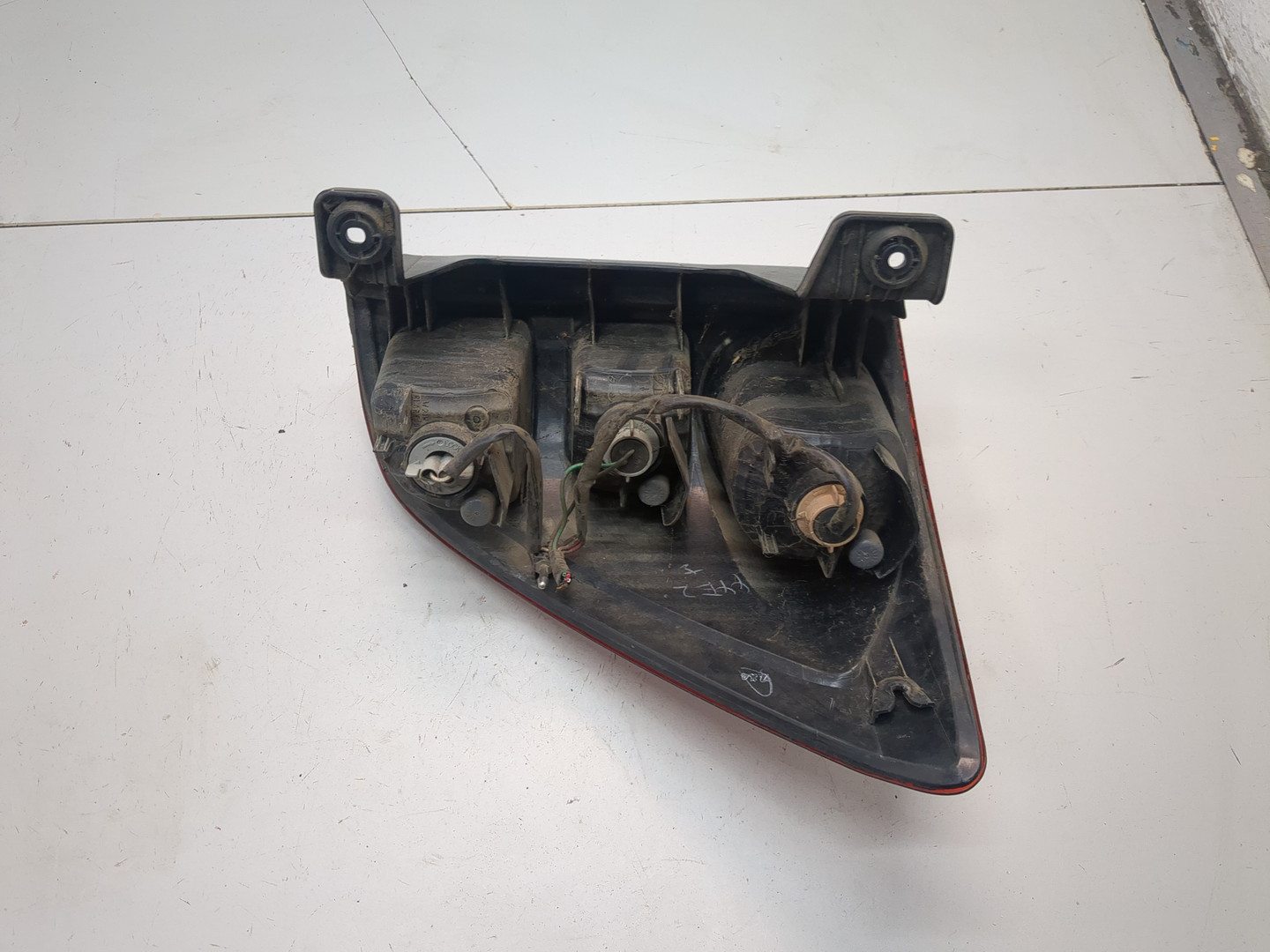 Фонарь задний левый