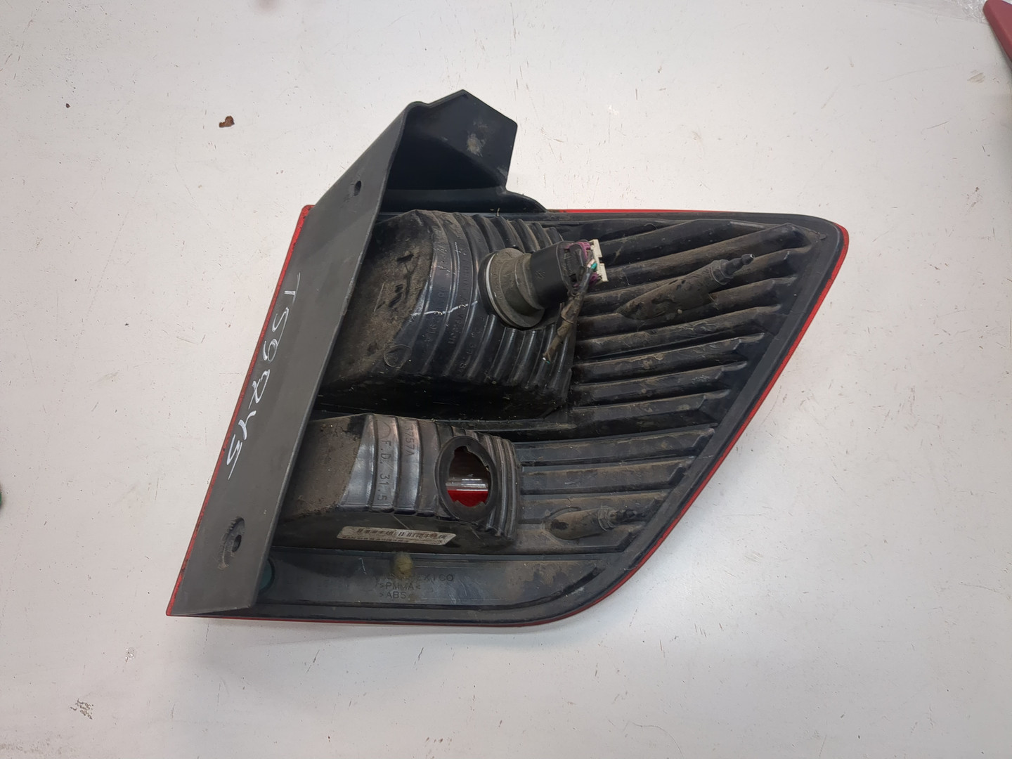 Фонарь задний левый