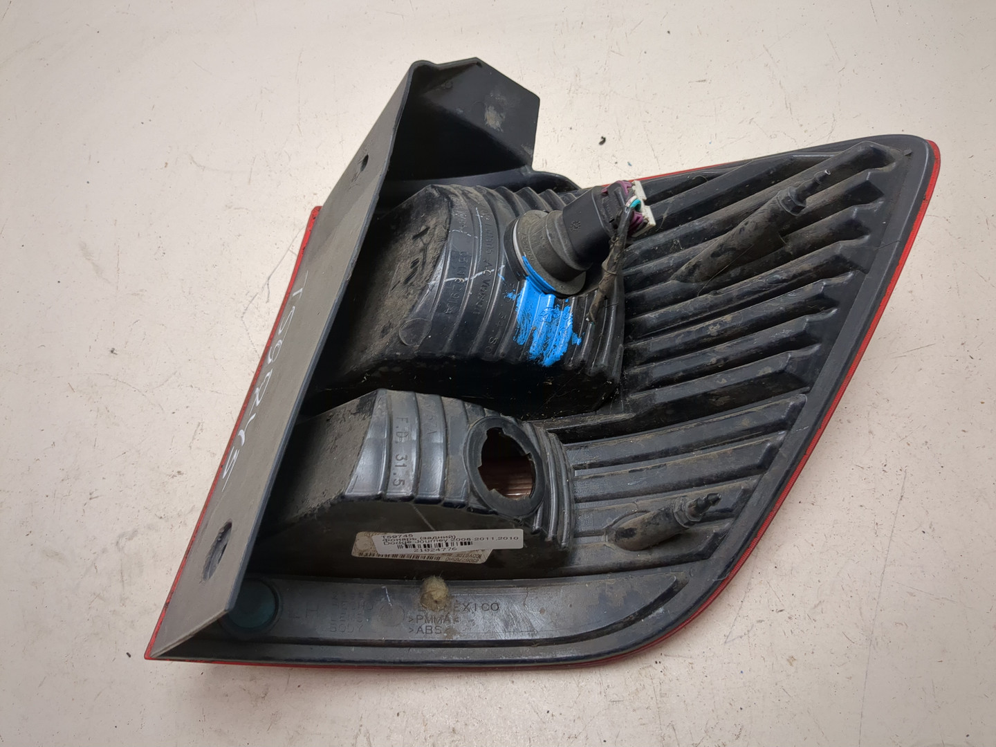 Фонарь задний левый