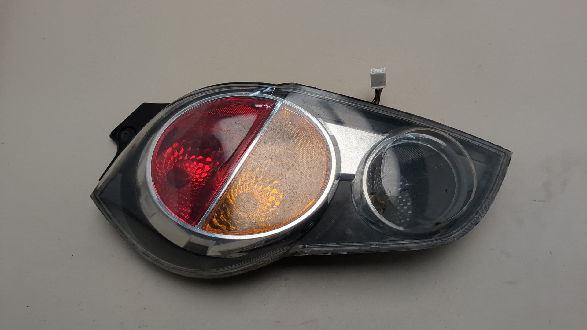 Фонарь задний левый