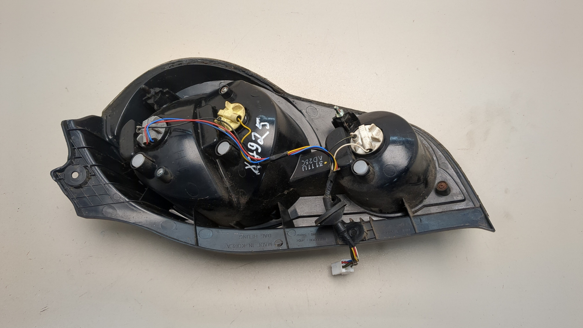 Фонарь задний левый