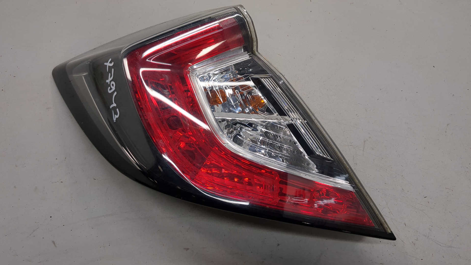 Фонарь задний левый