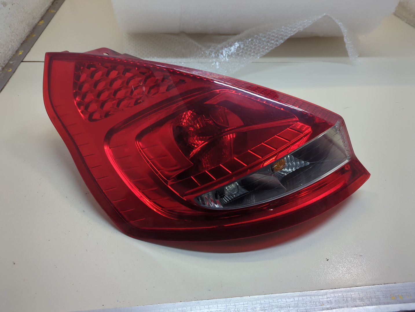 Фонарь задний левый