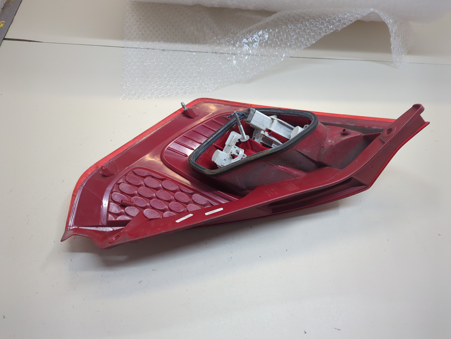 Фонарь задний левый