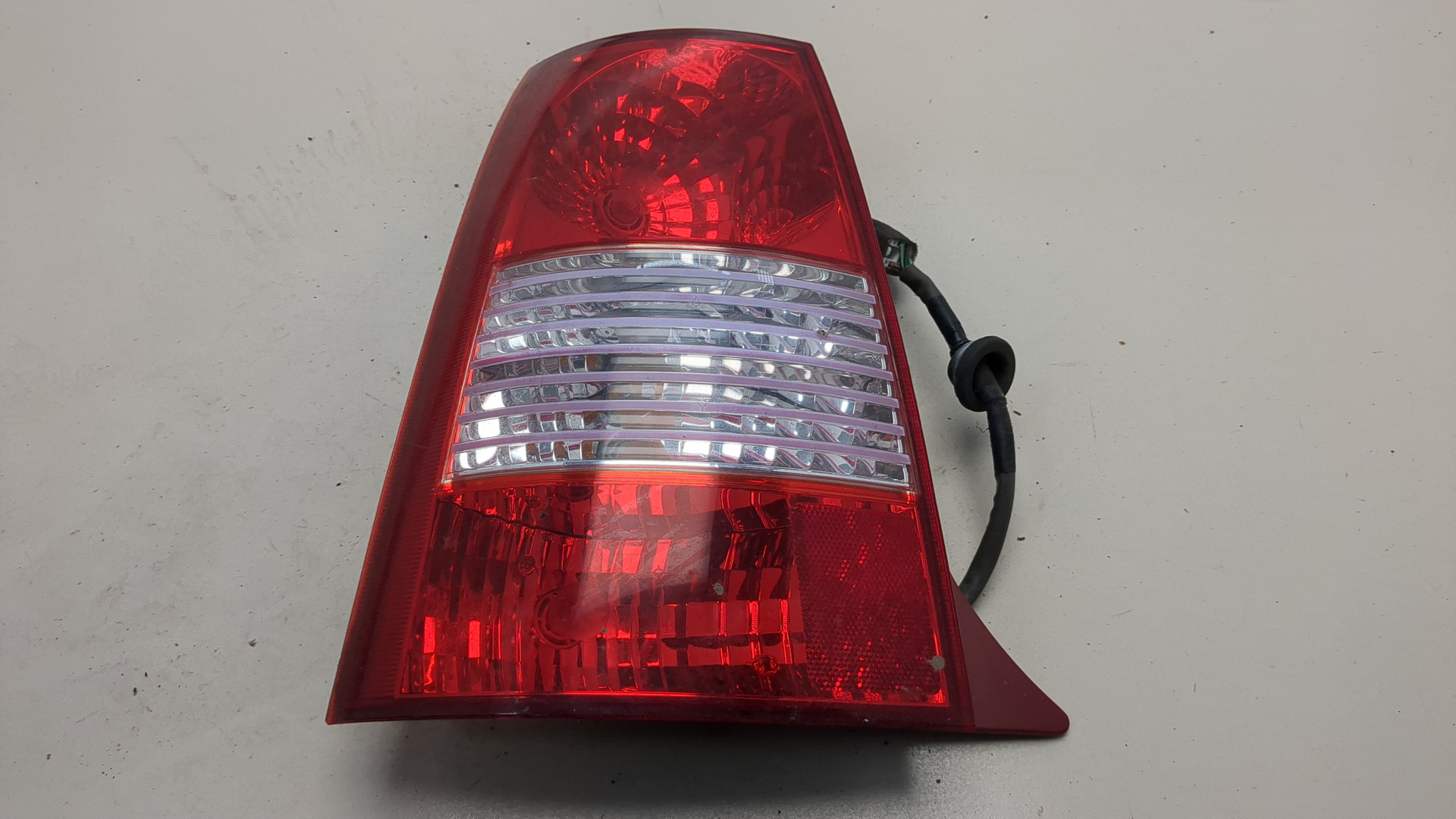 Фонарь задний левый