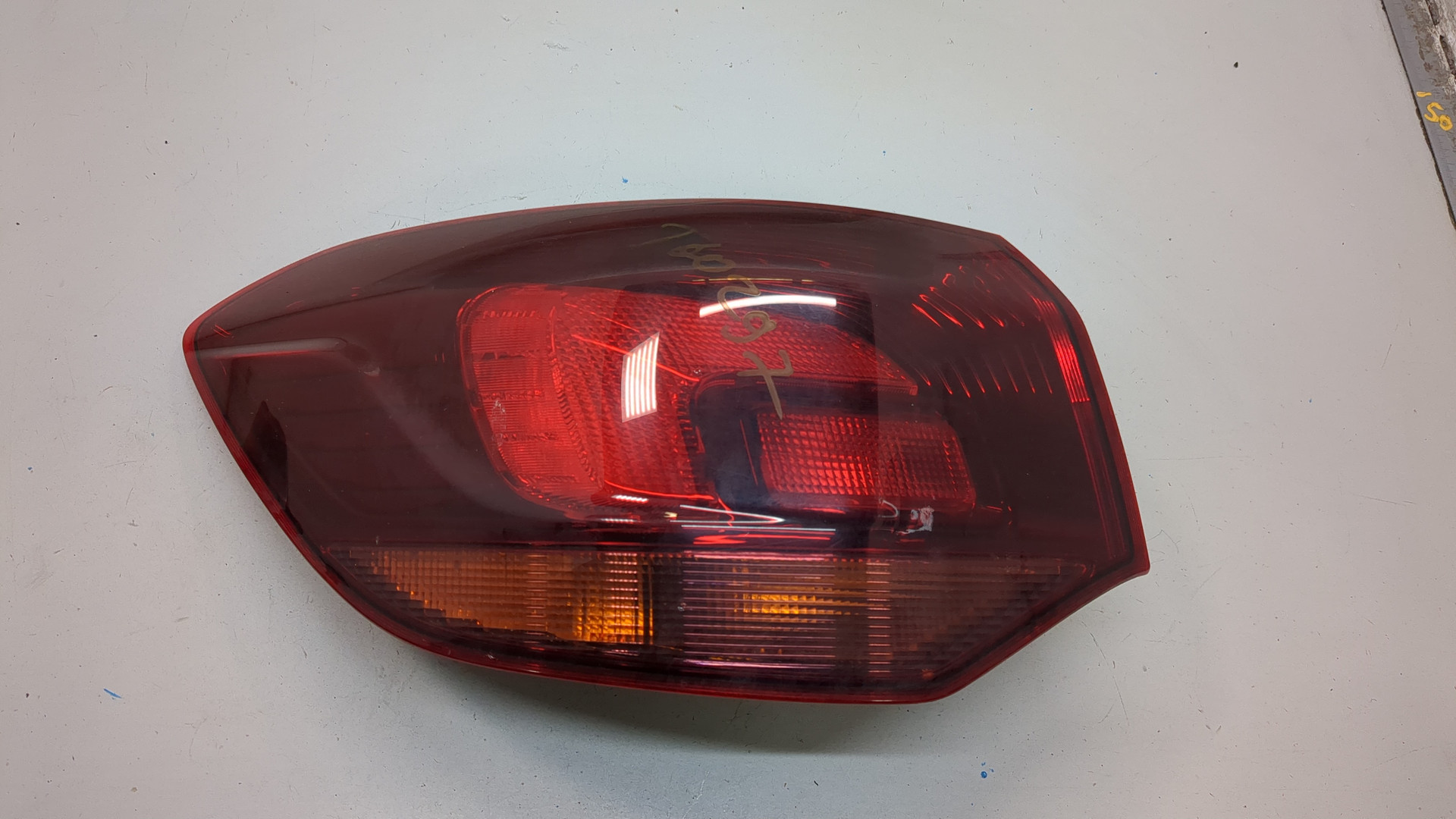 Фонарь задний левый