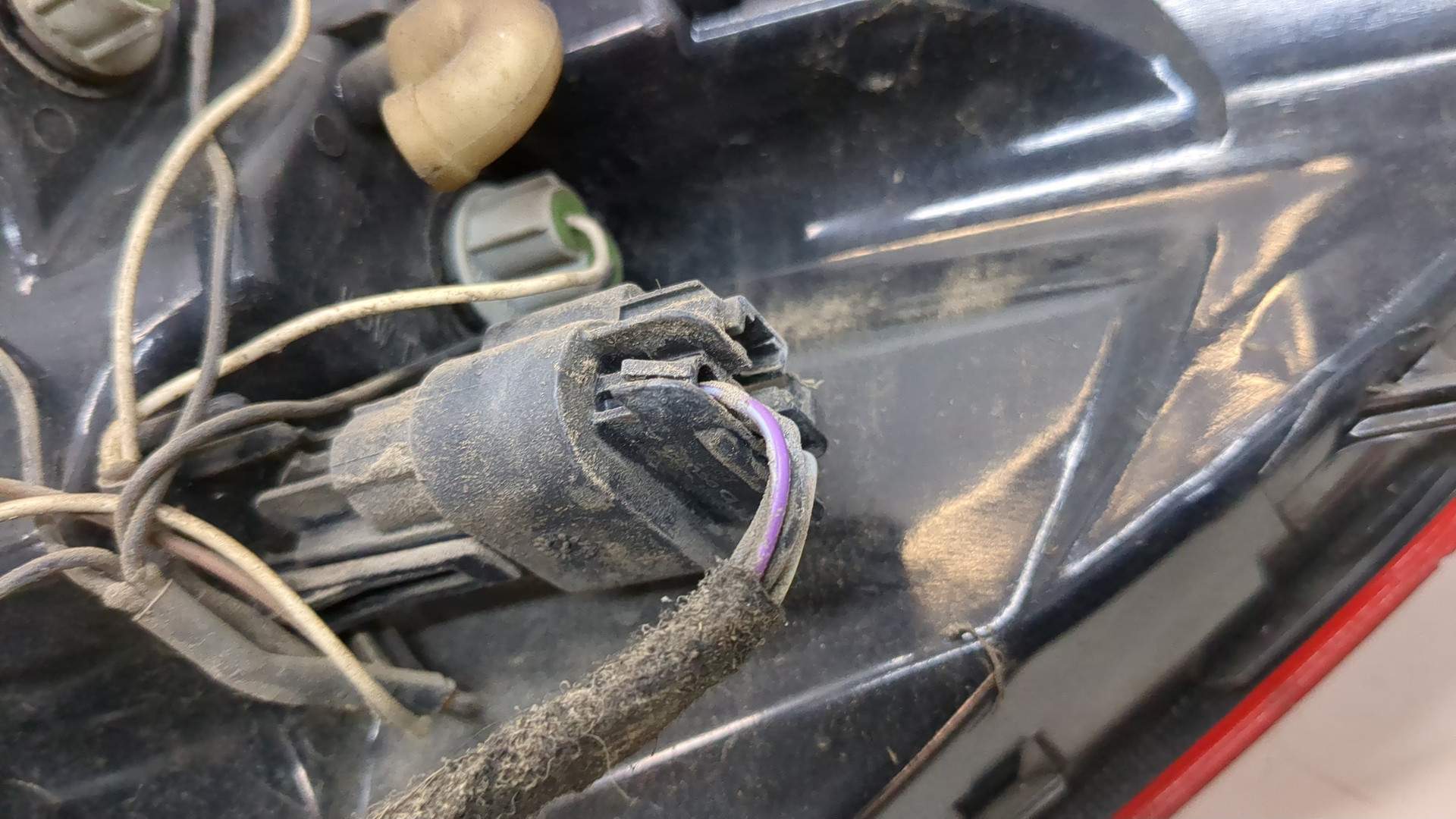 Фонарь задний левый