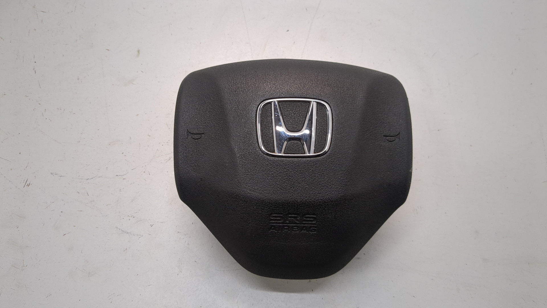 Подушка безопасности в рулевое колесо