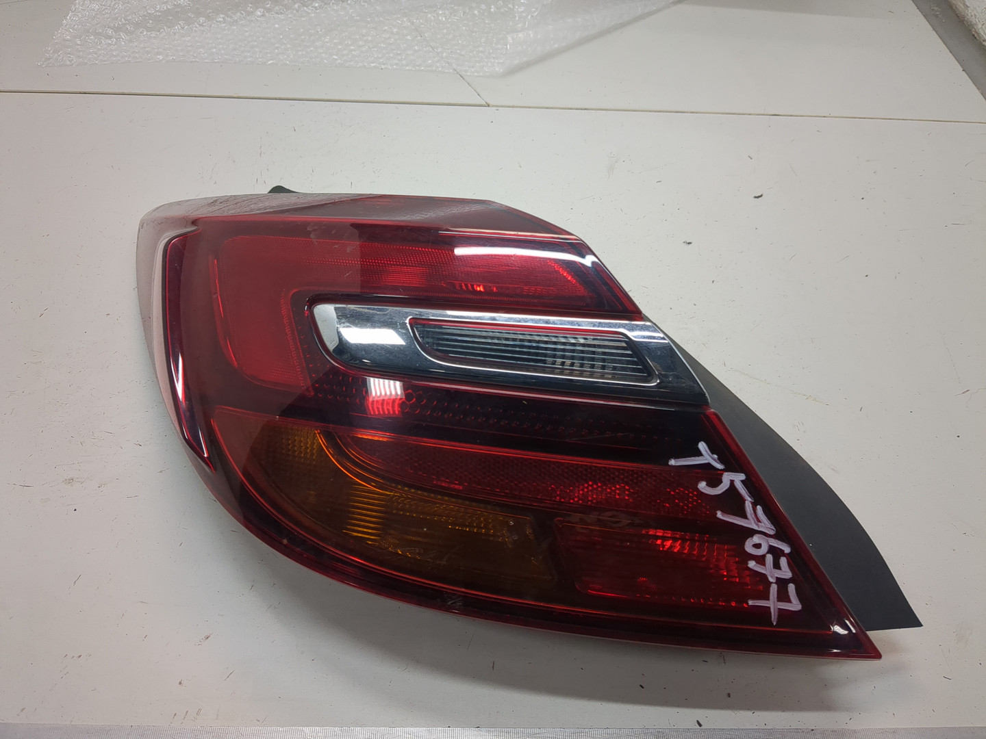 Фонарь задний левый