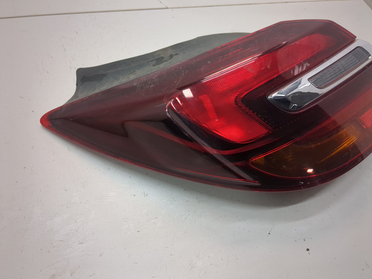 Фонарь задний левый