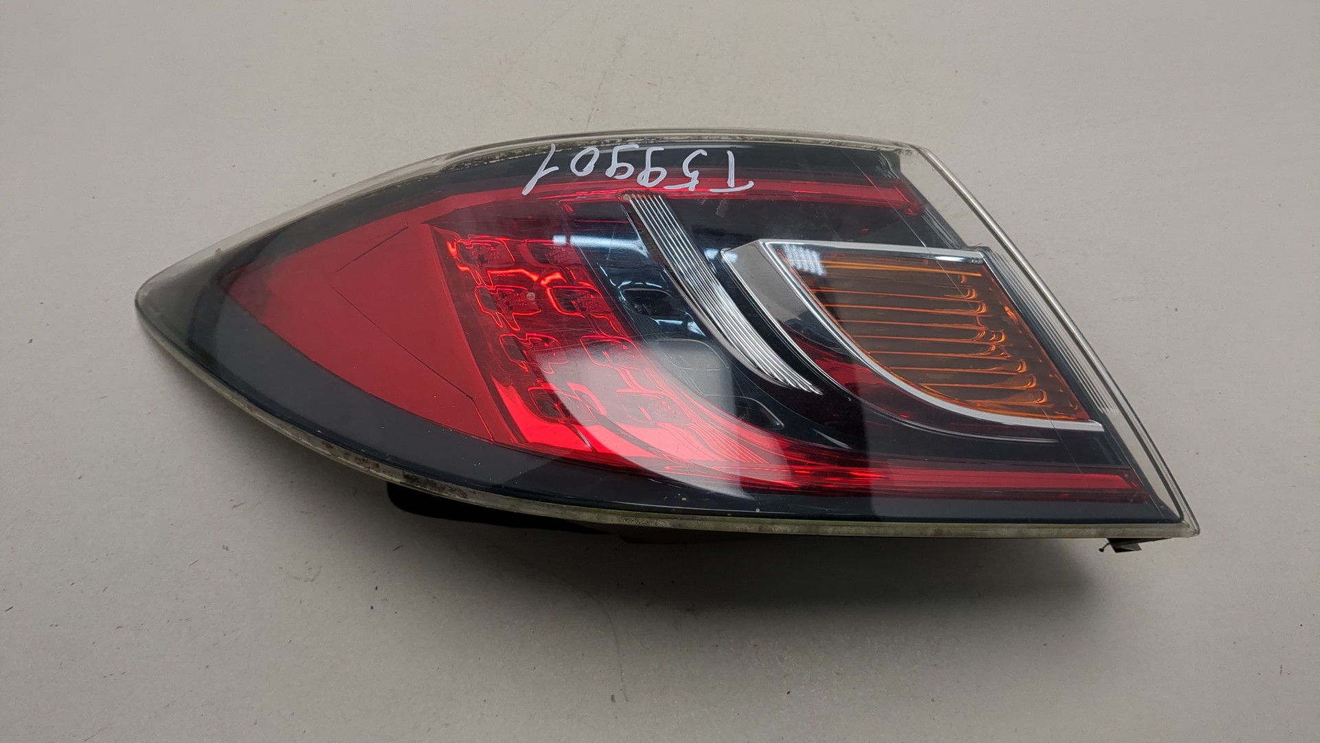 Фонарь задний левый