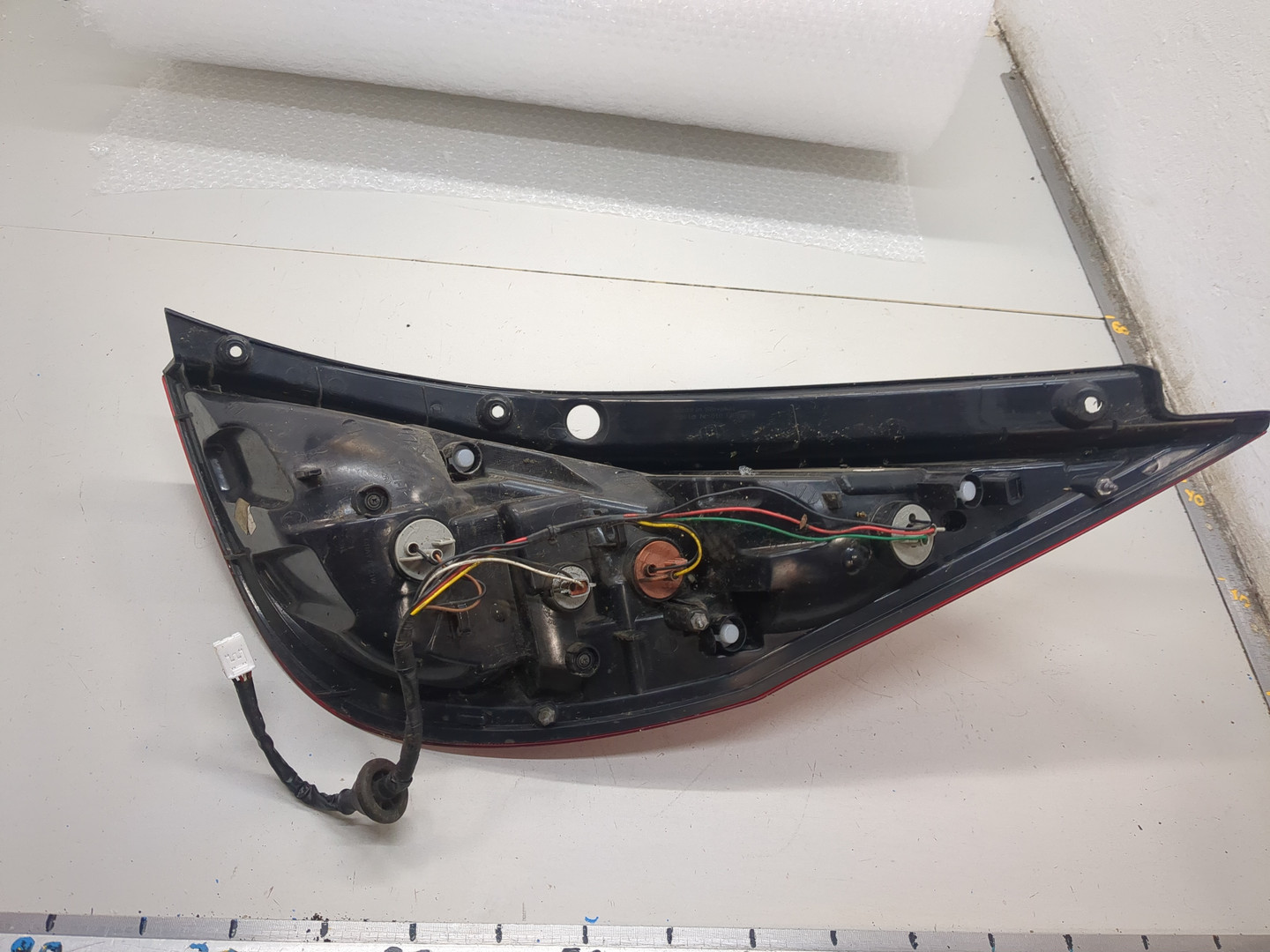 Фонарь задний левый