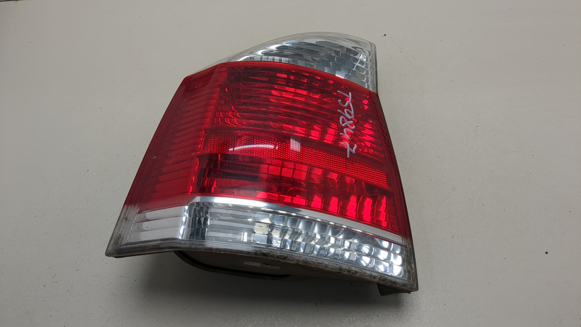 Фонарь задний левый