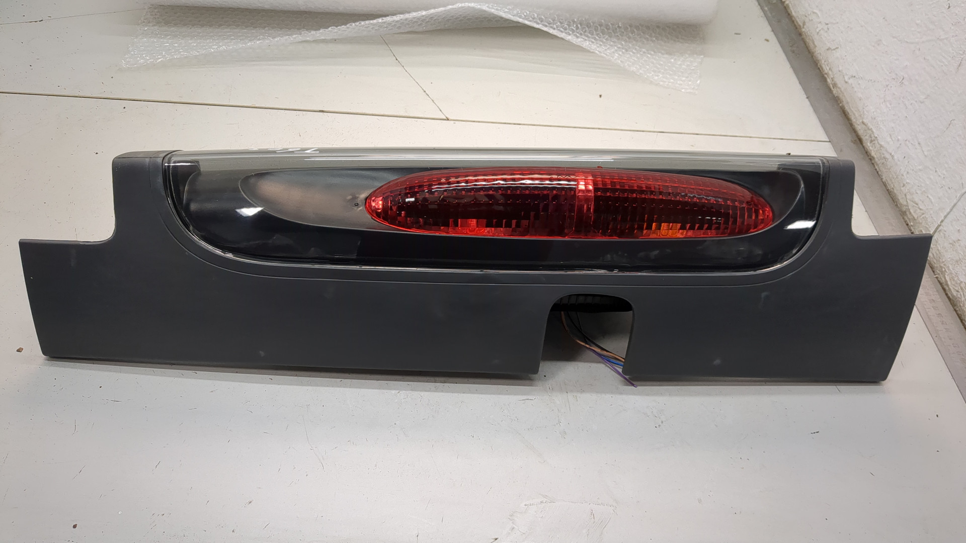 Фонарь задний левый