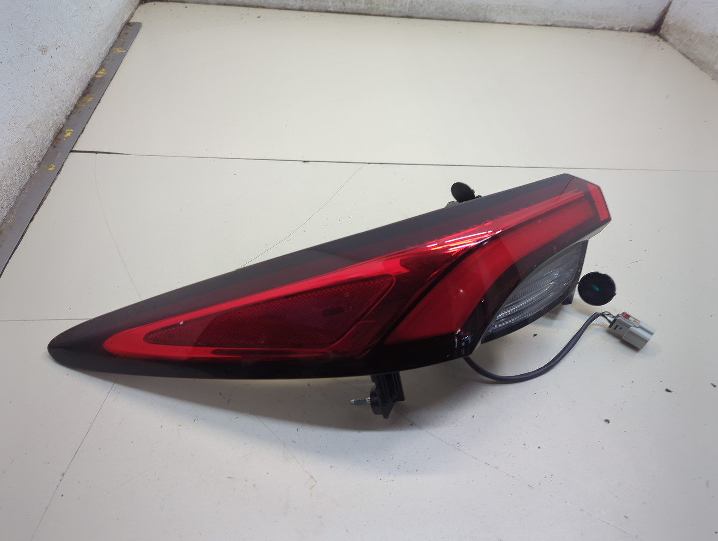 Фонарь задний левый