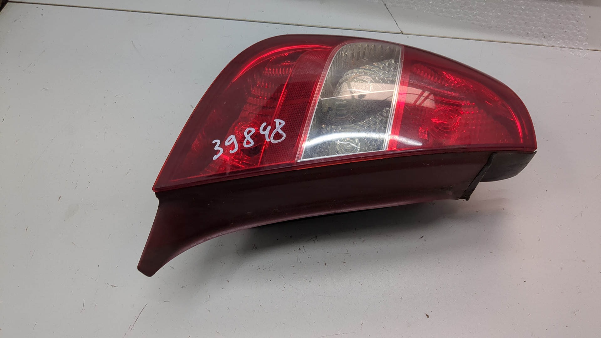 Фонарь задний левый