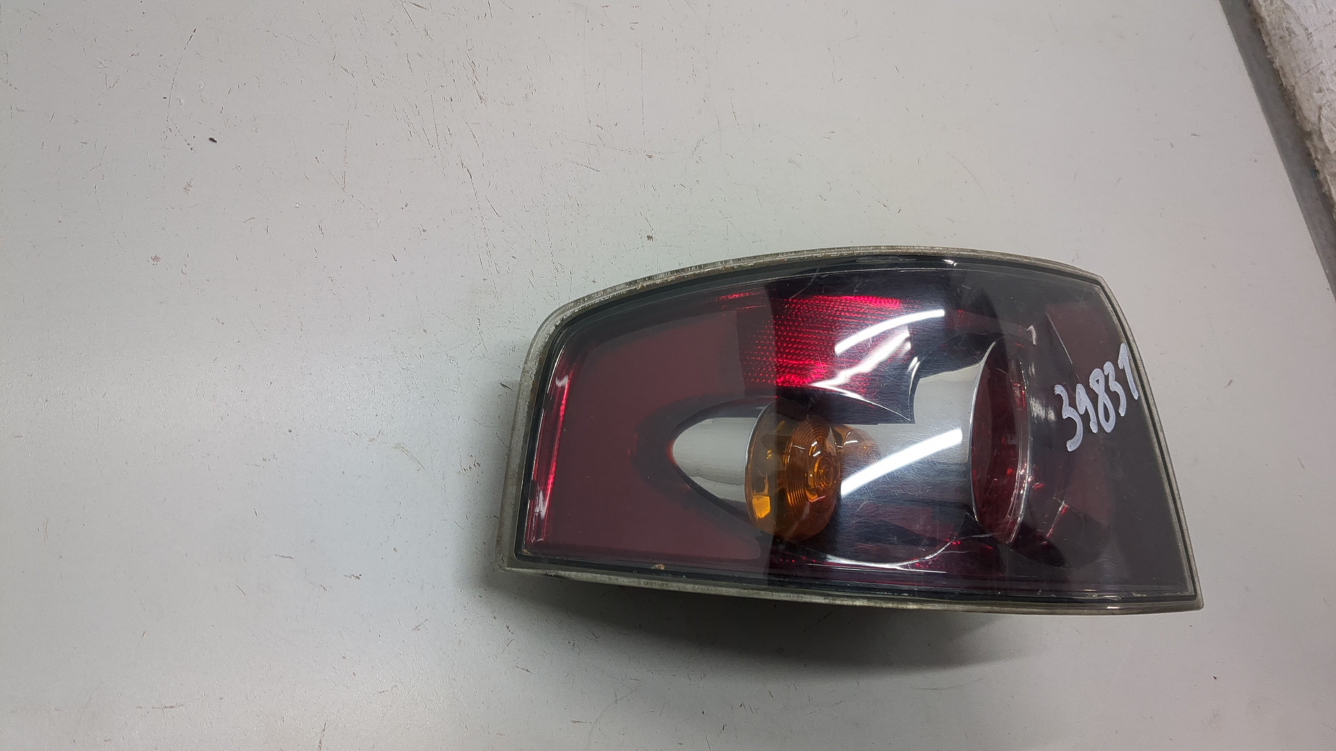 Фонарь задний левый