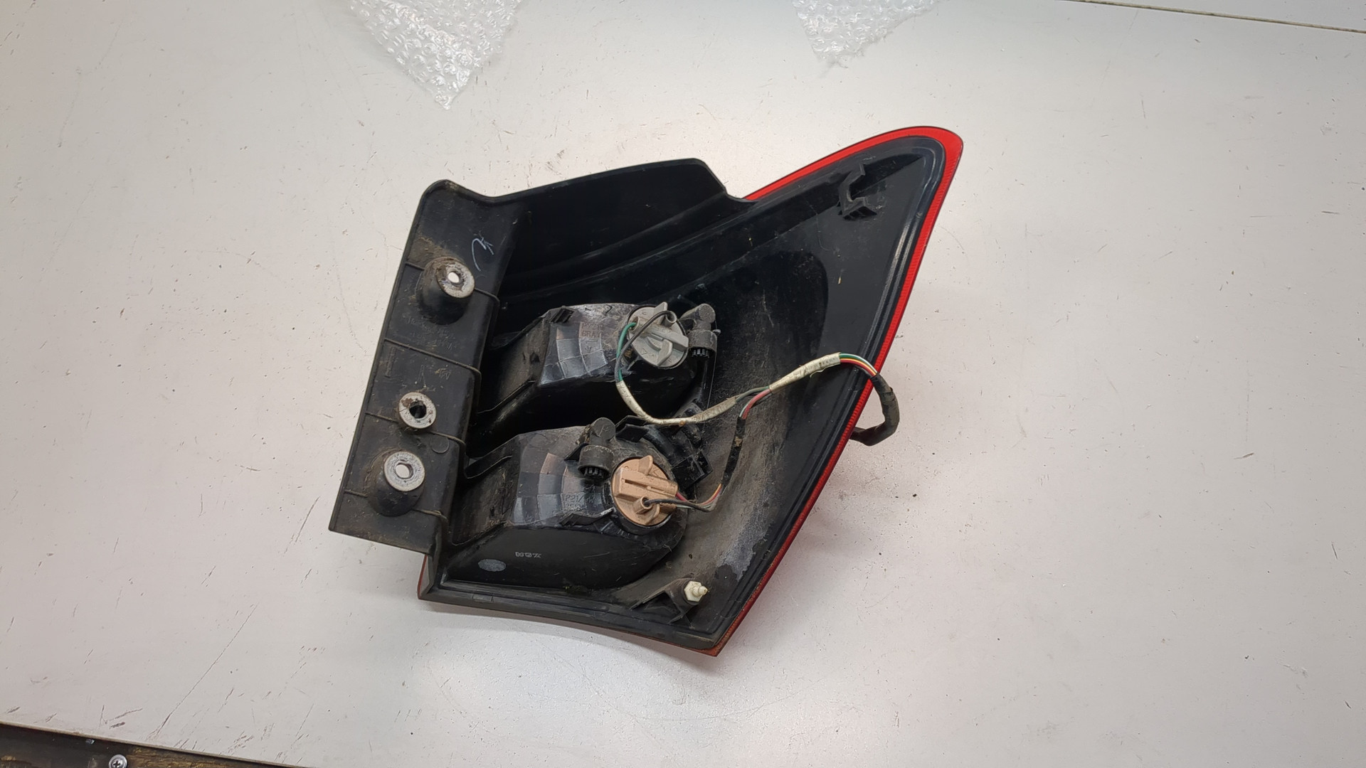 Фонарь задний левый