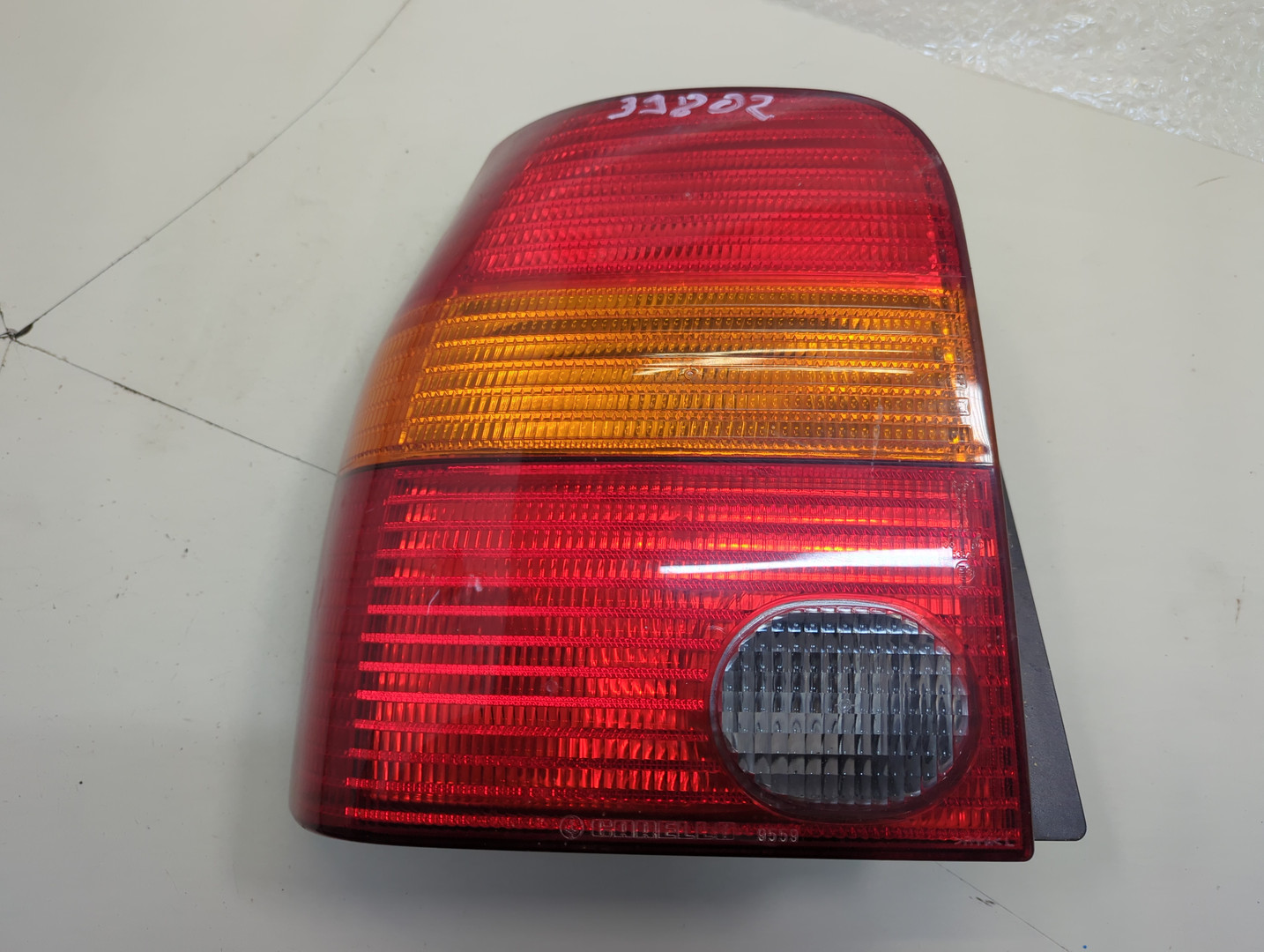 Фонарь задний левый