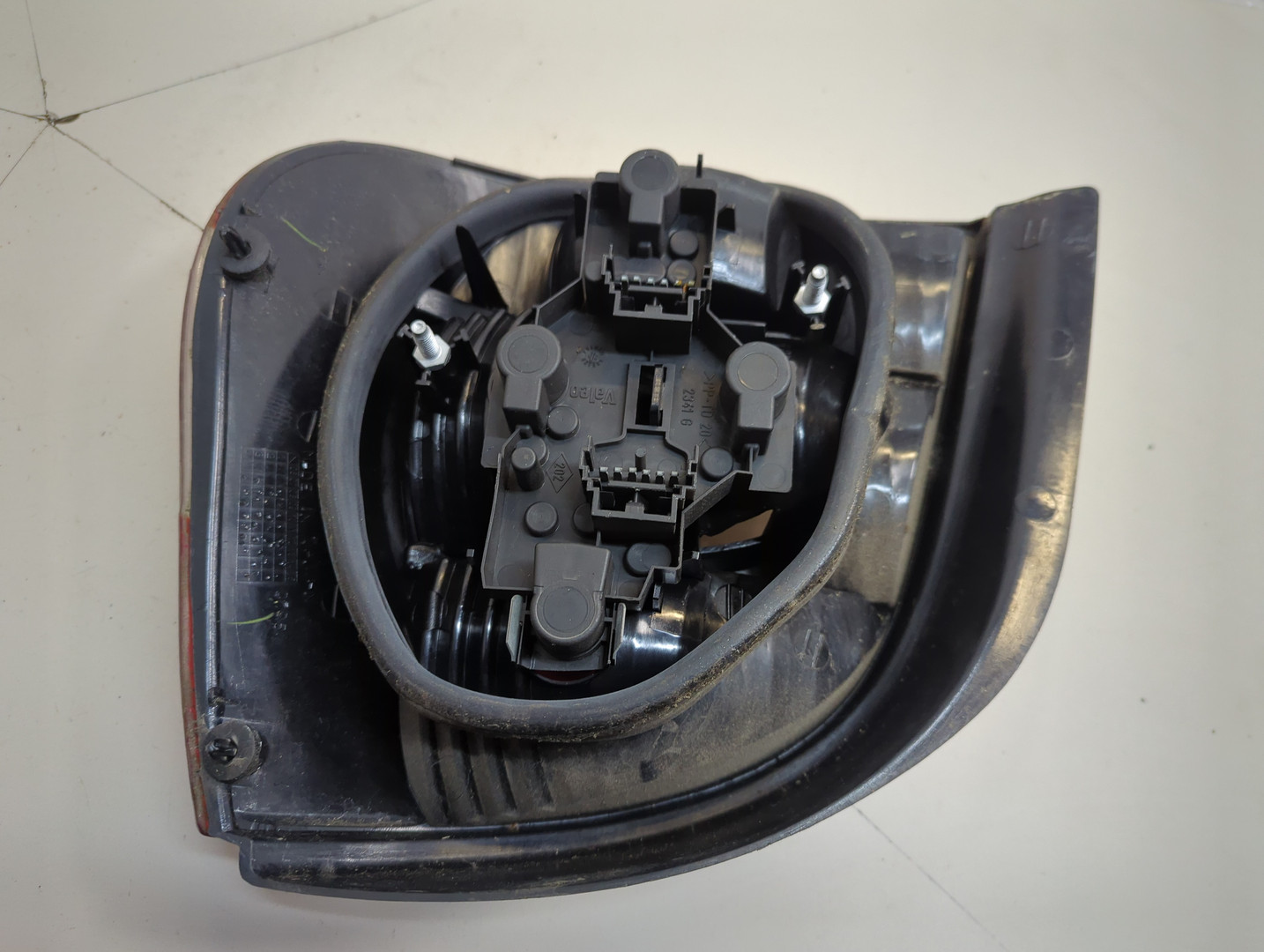 Фонарь задний левый