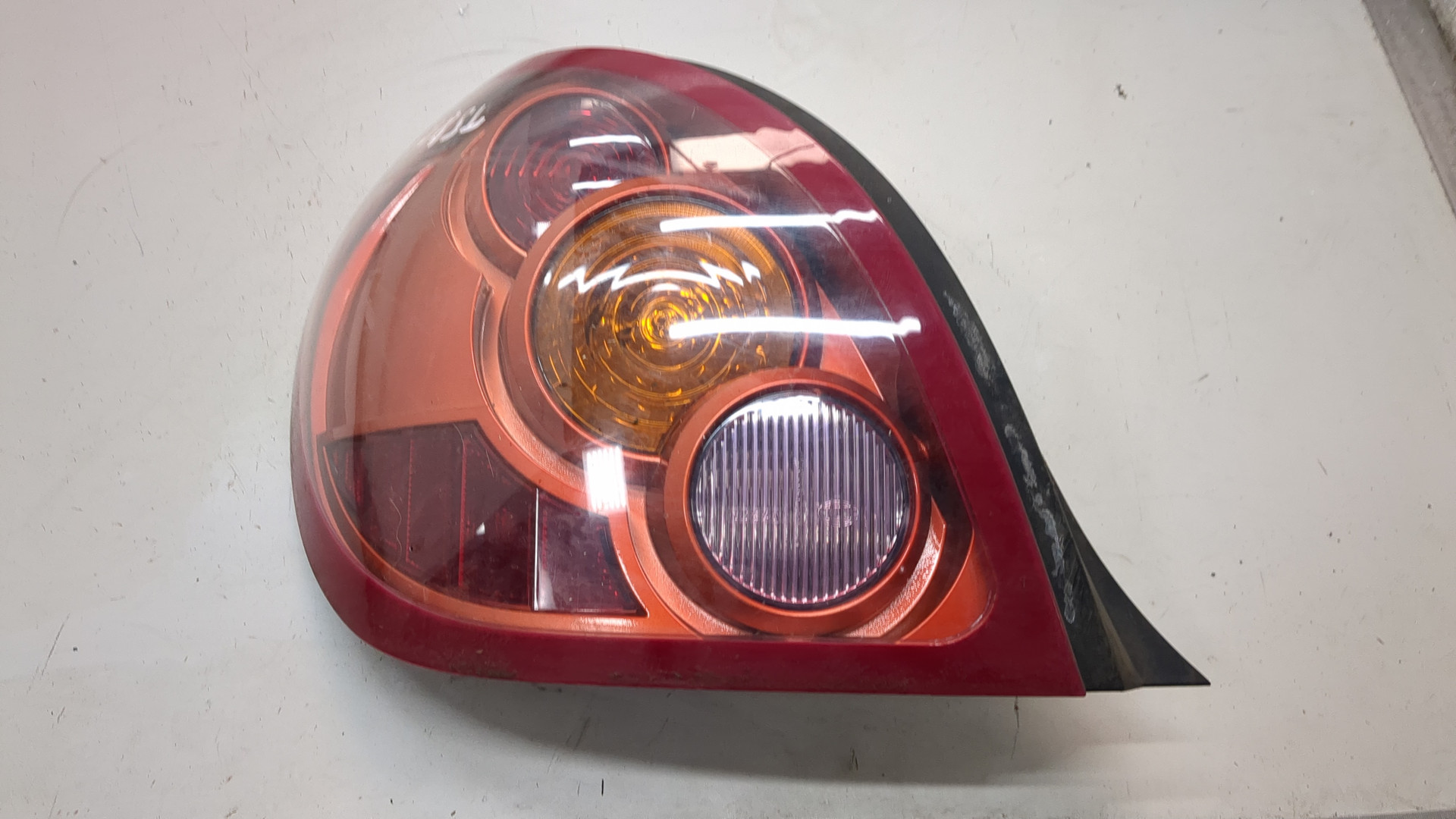 Фонарь задний левый