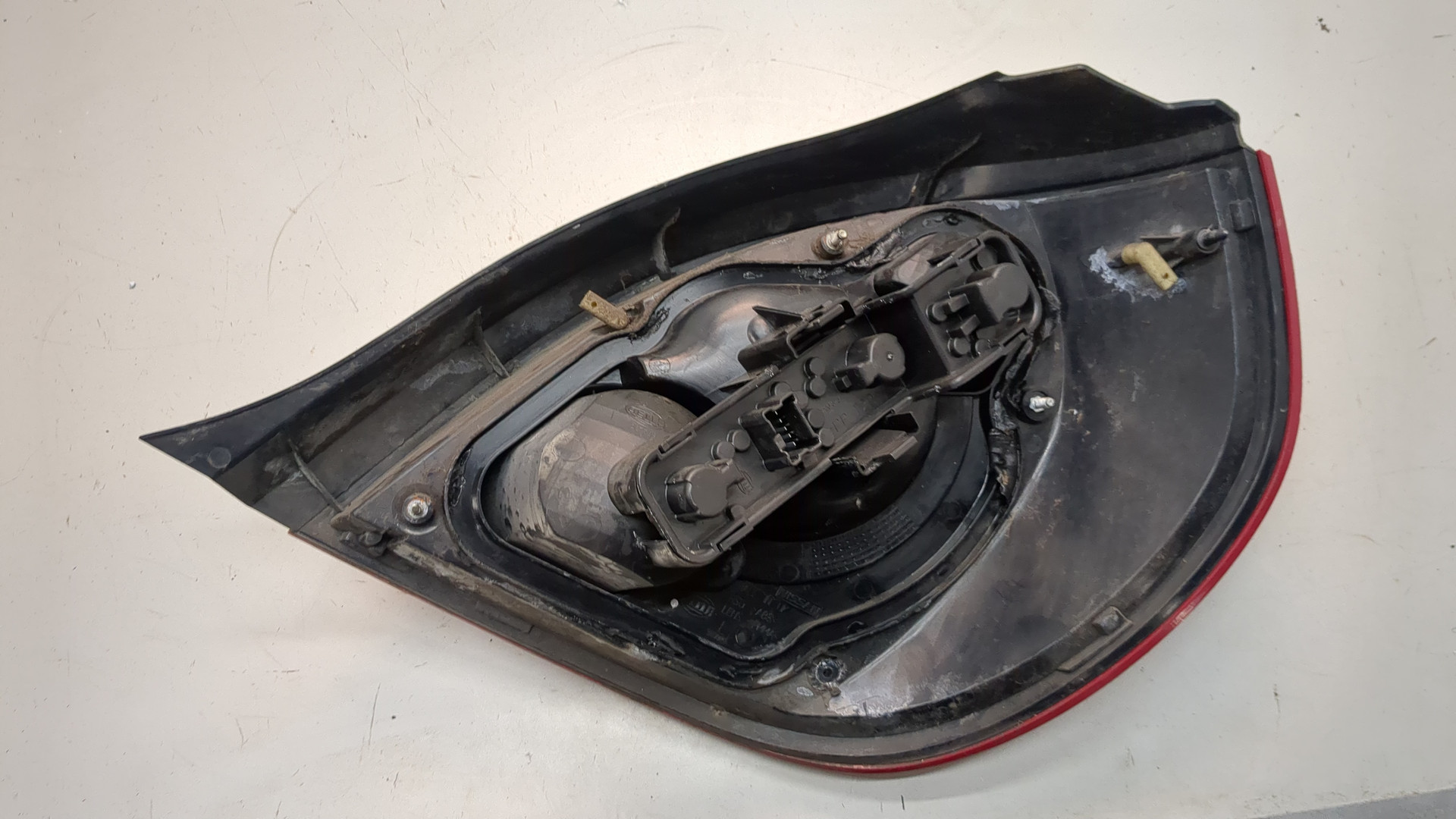 Фонарь задний левый