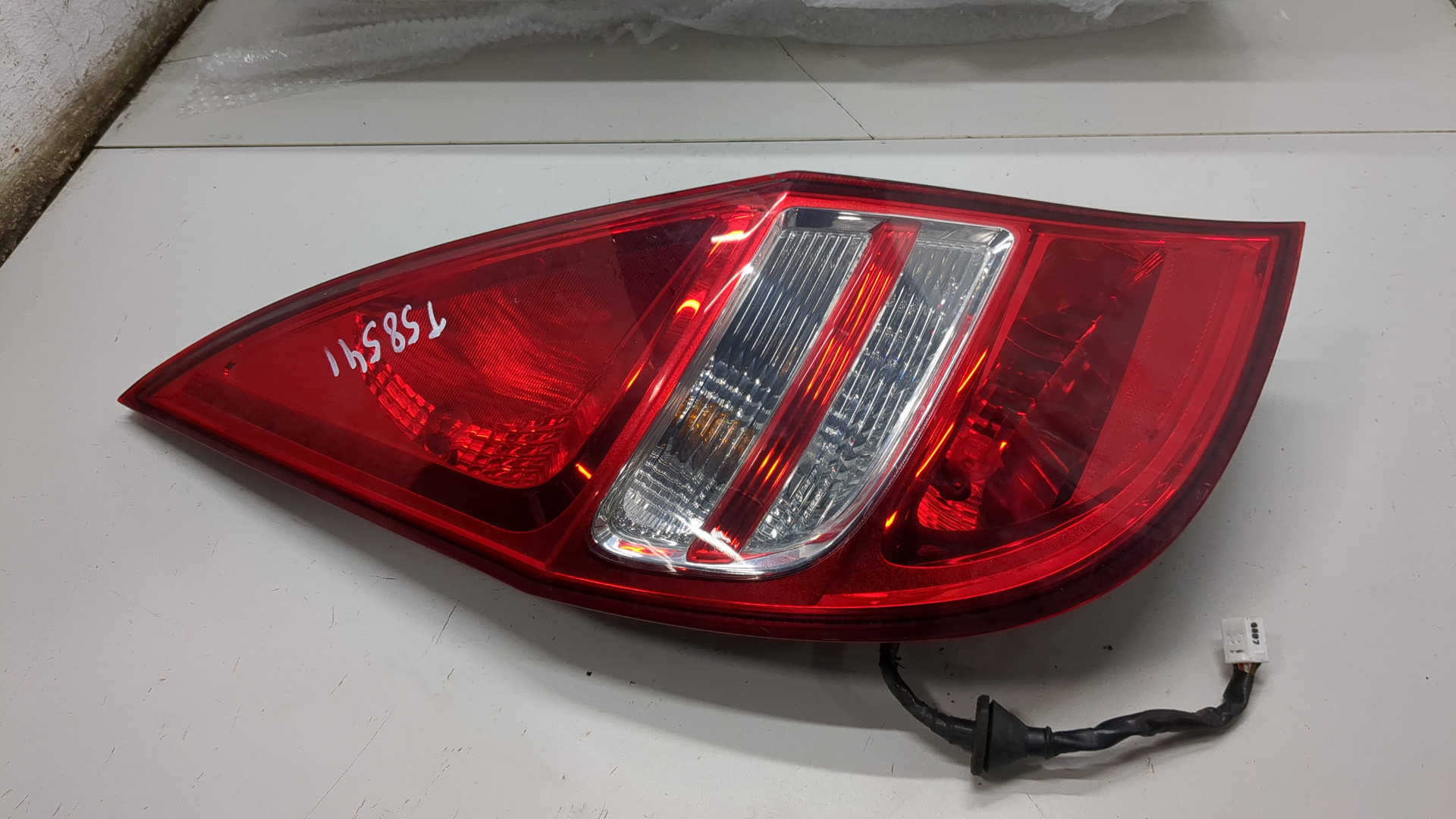 Фонарь задний левый