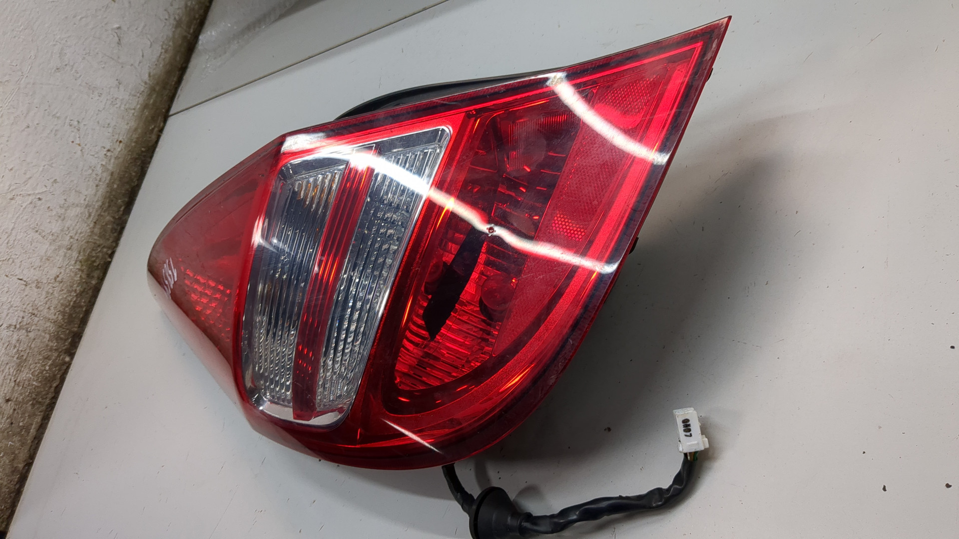 Фонарь задний левый