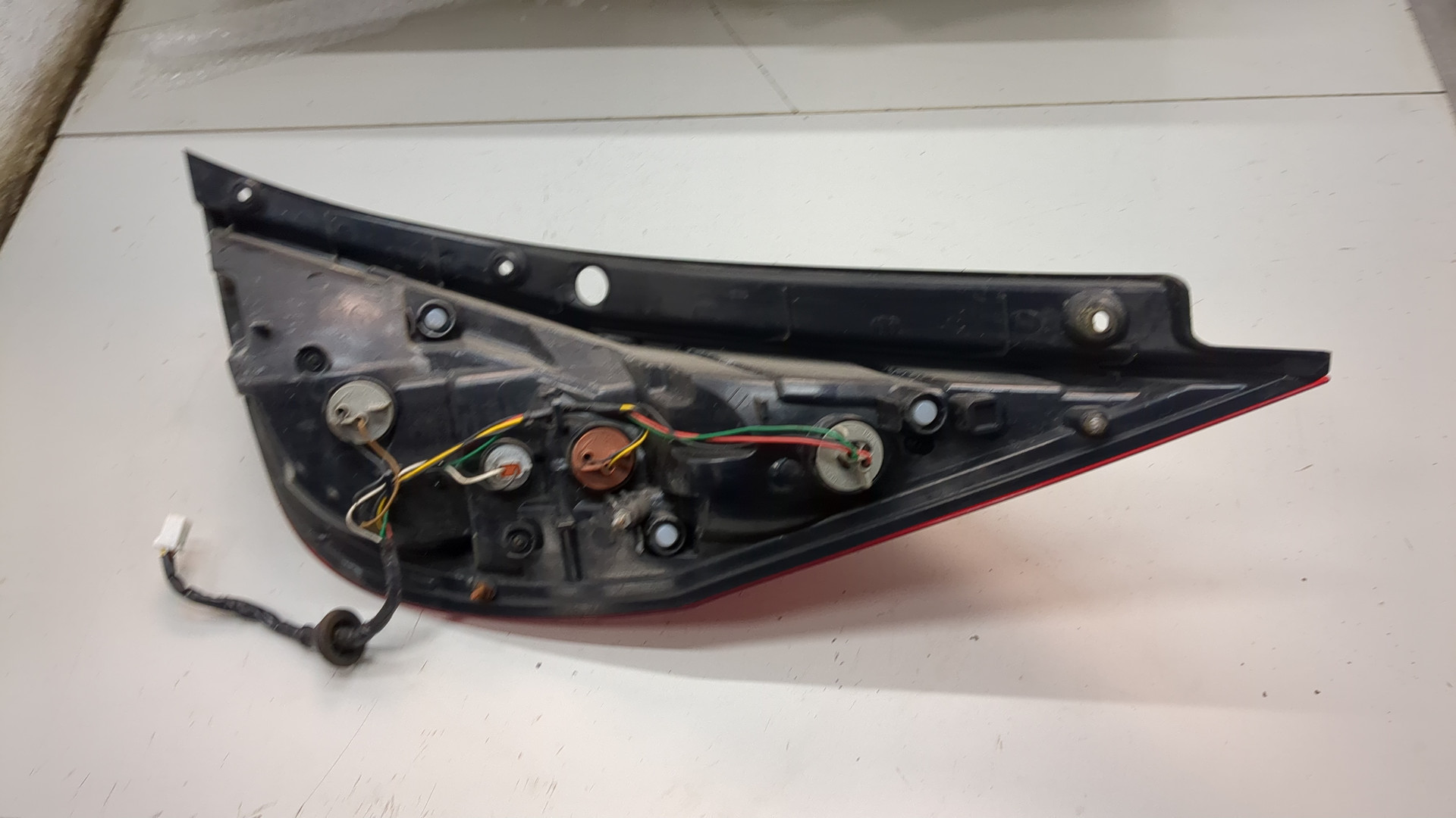 Фонарь задний левый