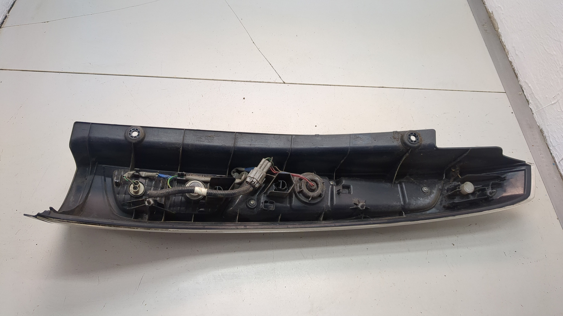 Фонарь задний левый