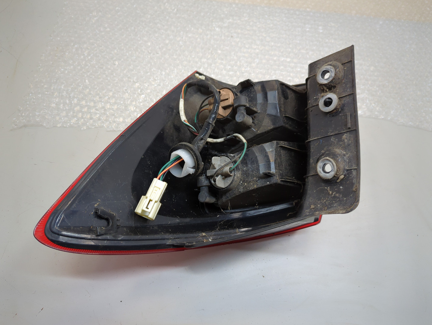 Фонарь задний левый