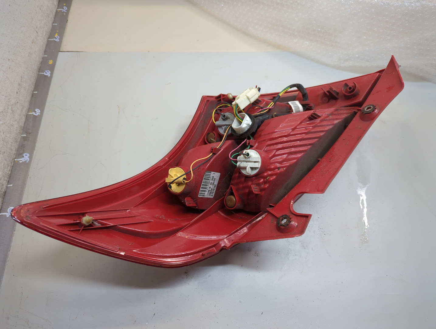 Фонарь задний левый