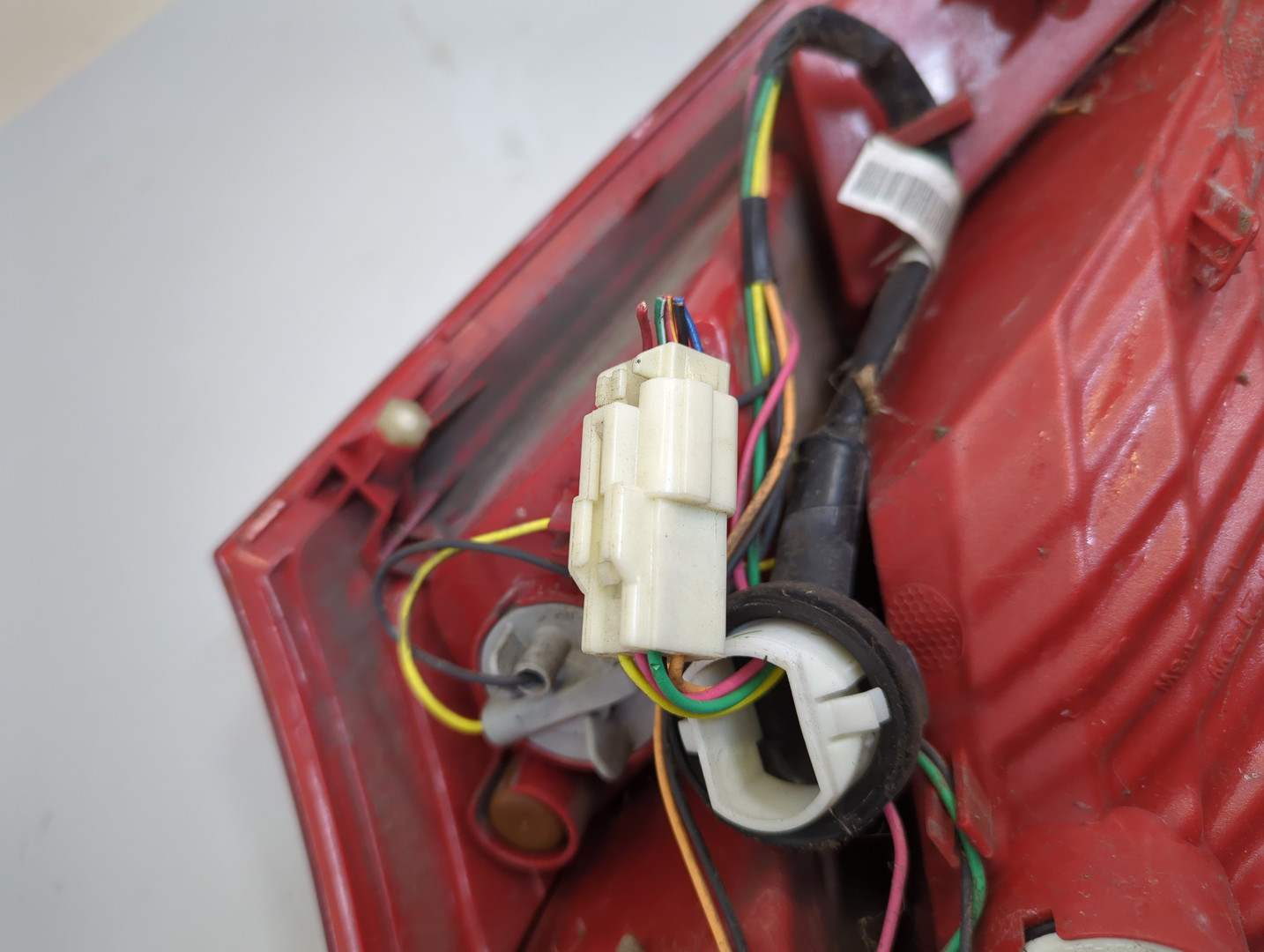 Фонарь задний левый