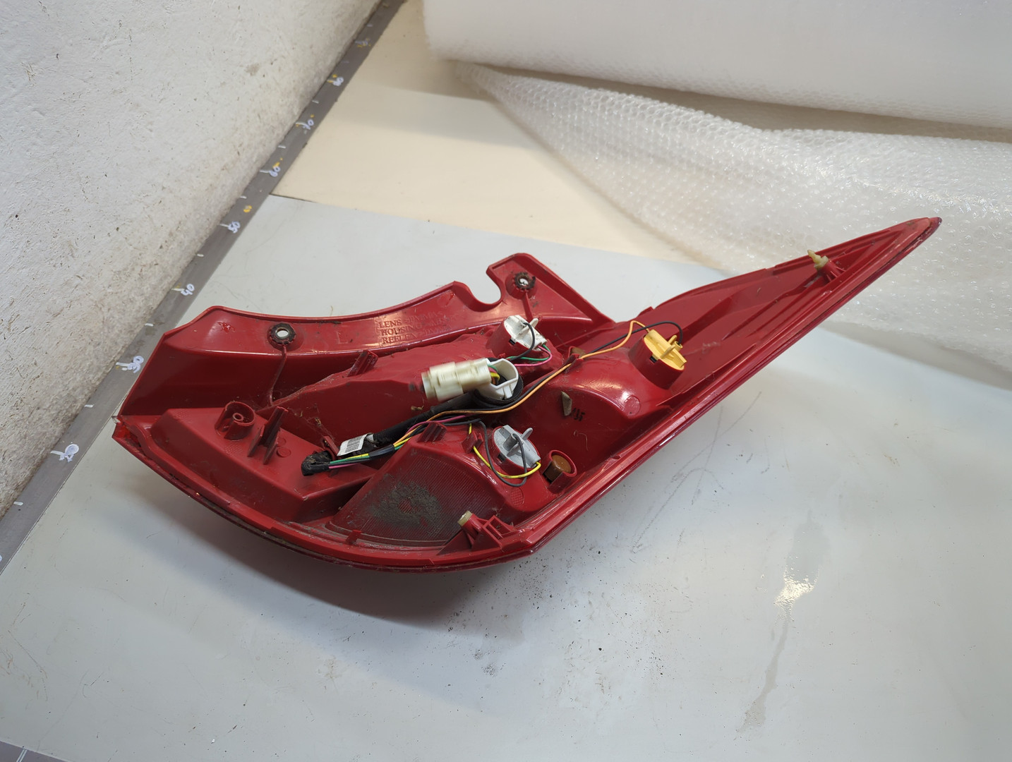 Фонарь задний левый