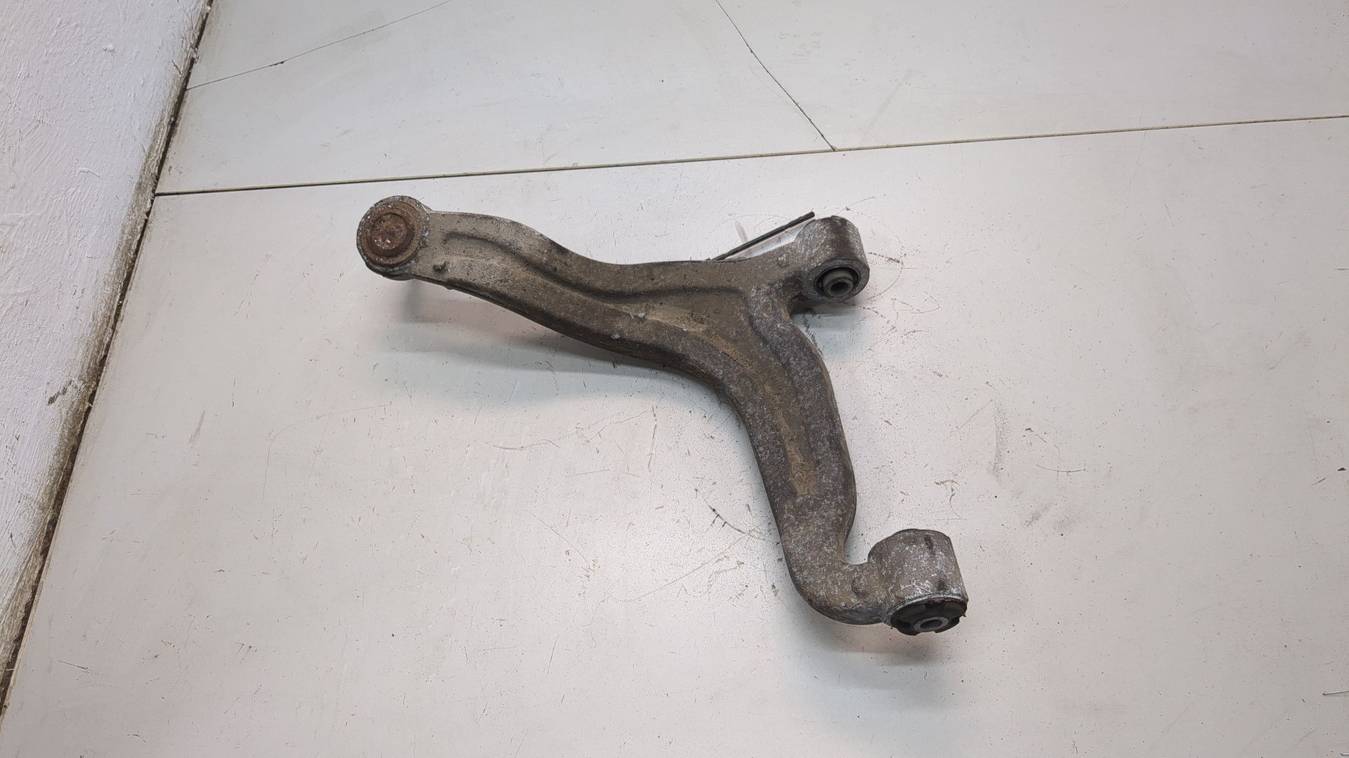 Рычаг задний левый