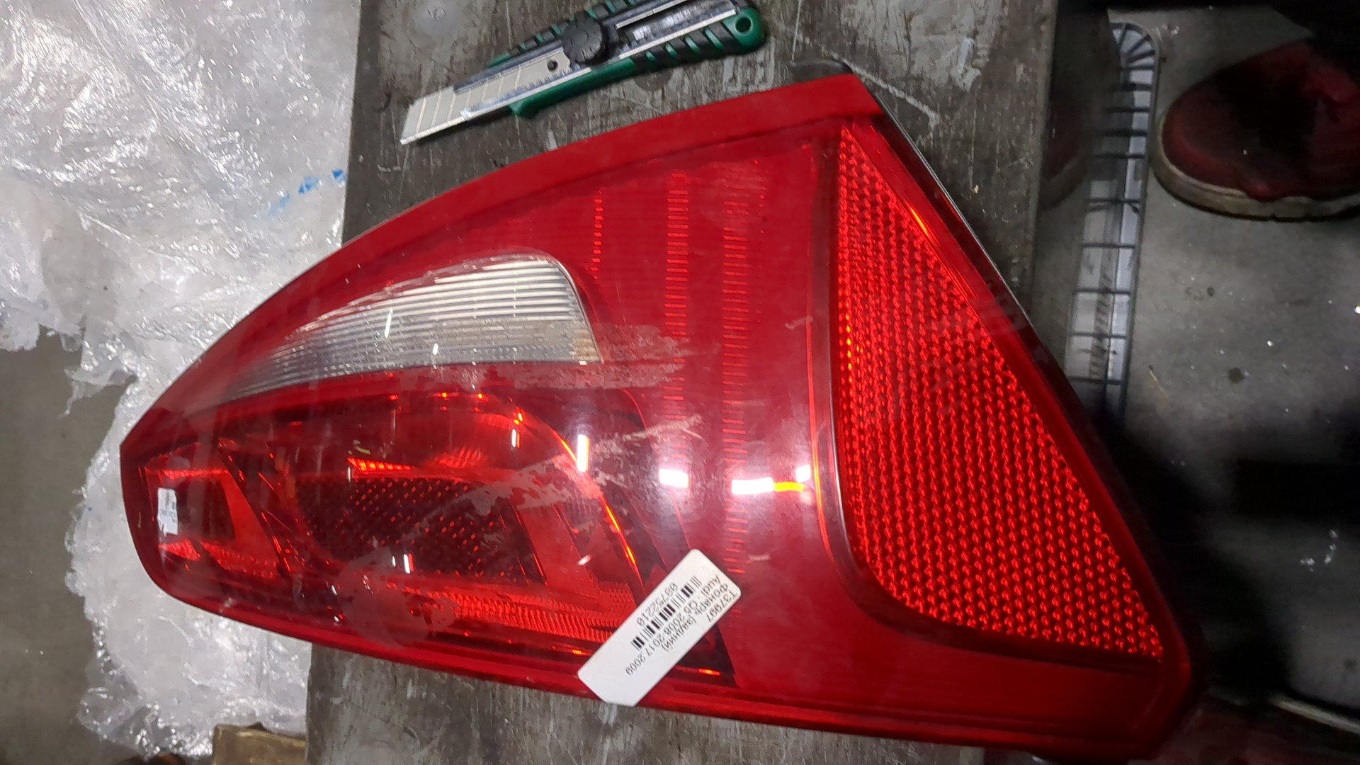 Фонарь задний левый