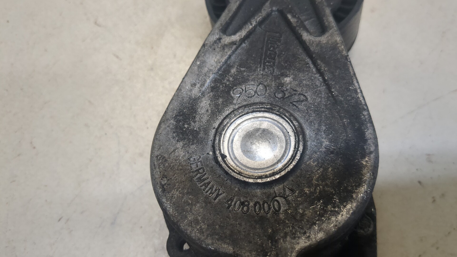 Натяжитель ремня