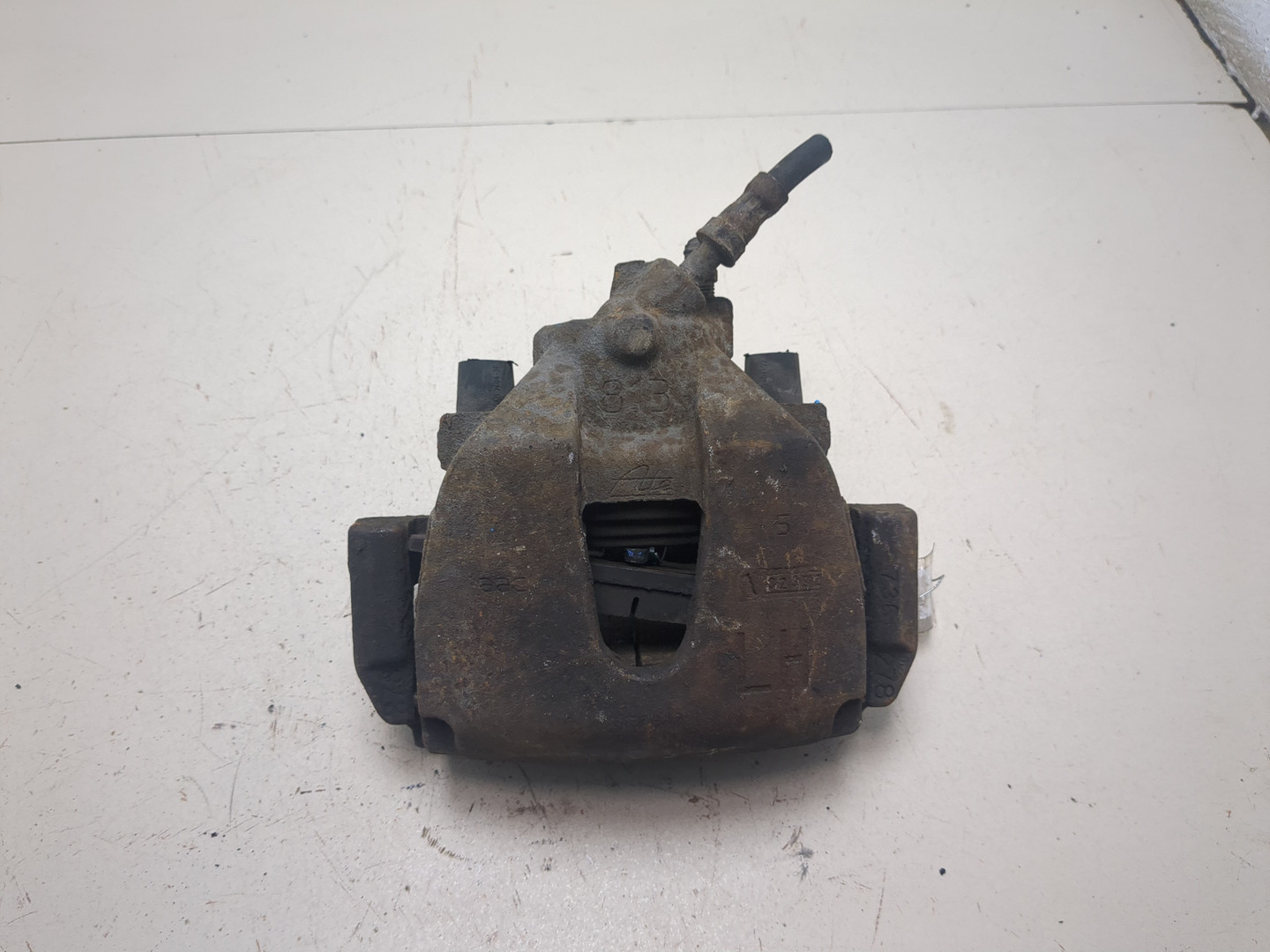 Суппорт передний левый