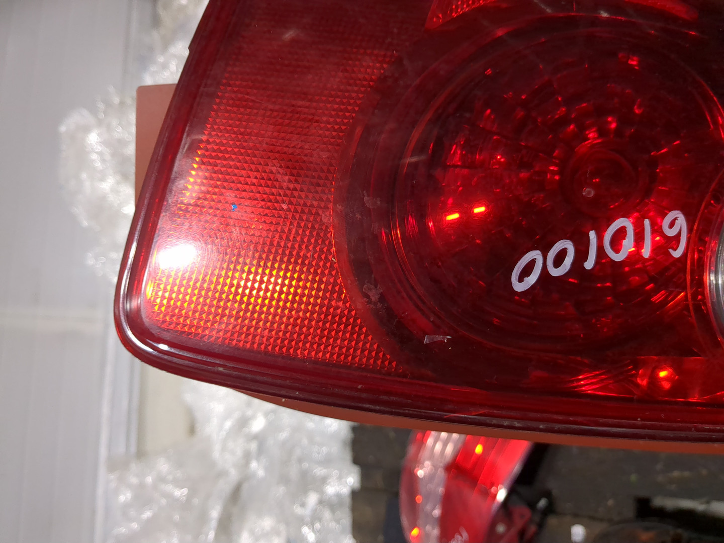 Фонарь задний левый