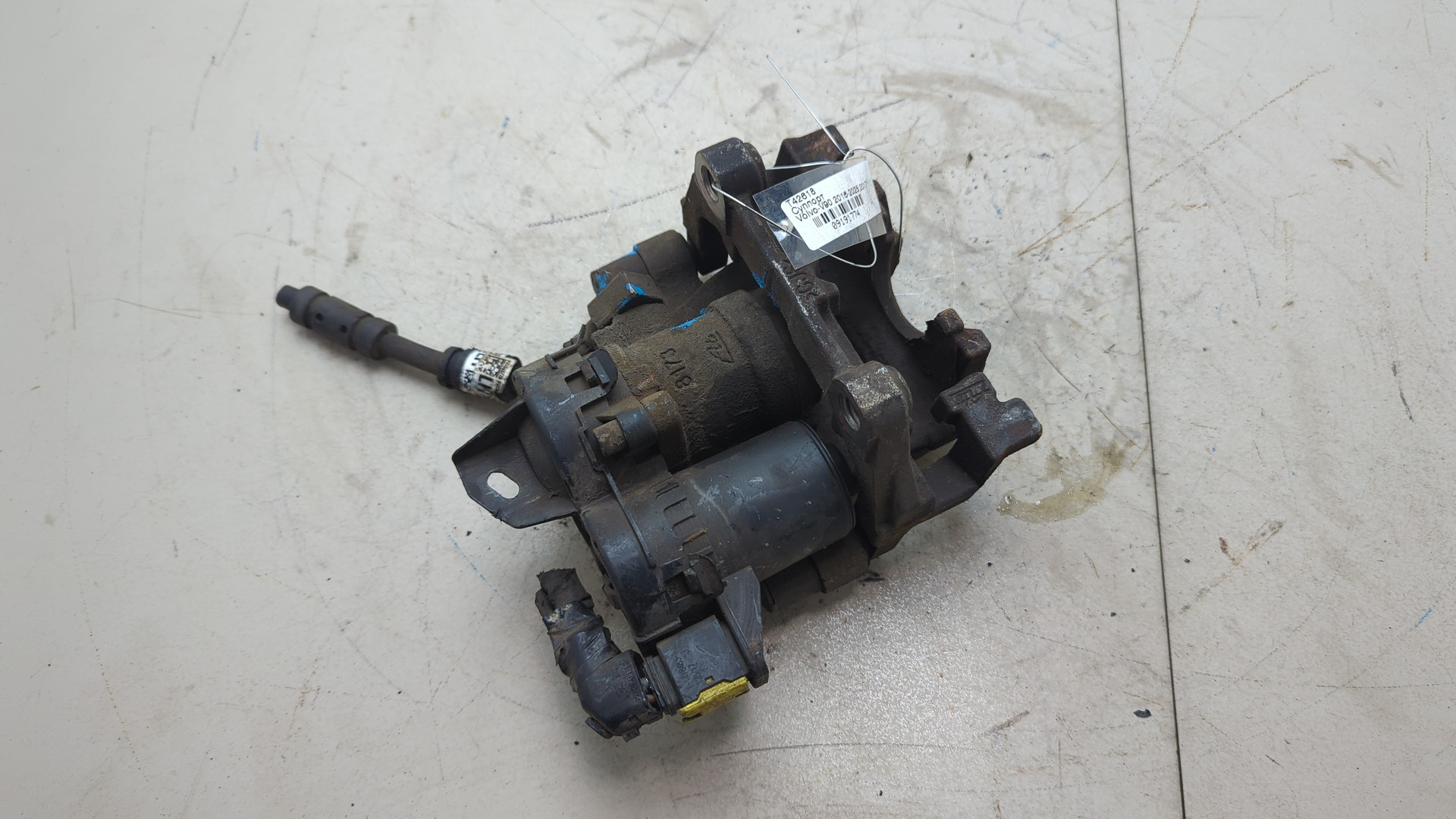 Суппорт задний левый