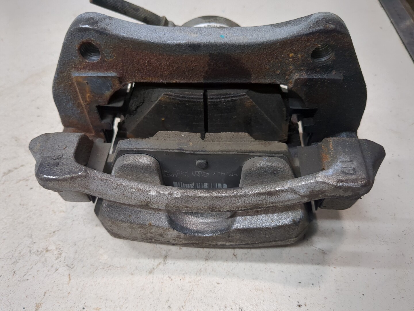 Суппорт передний левый