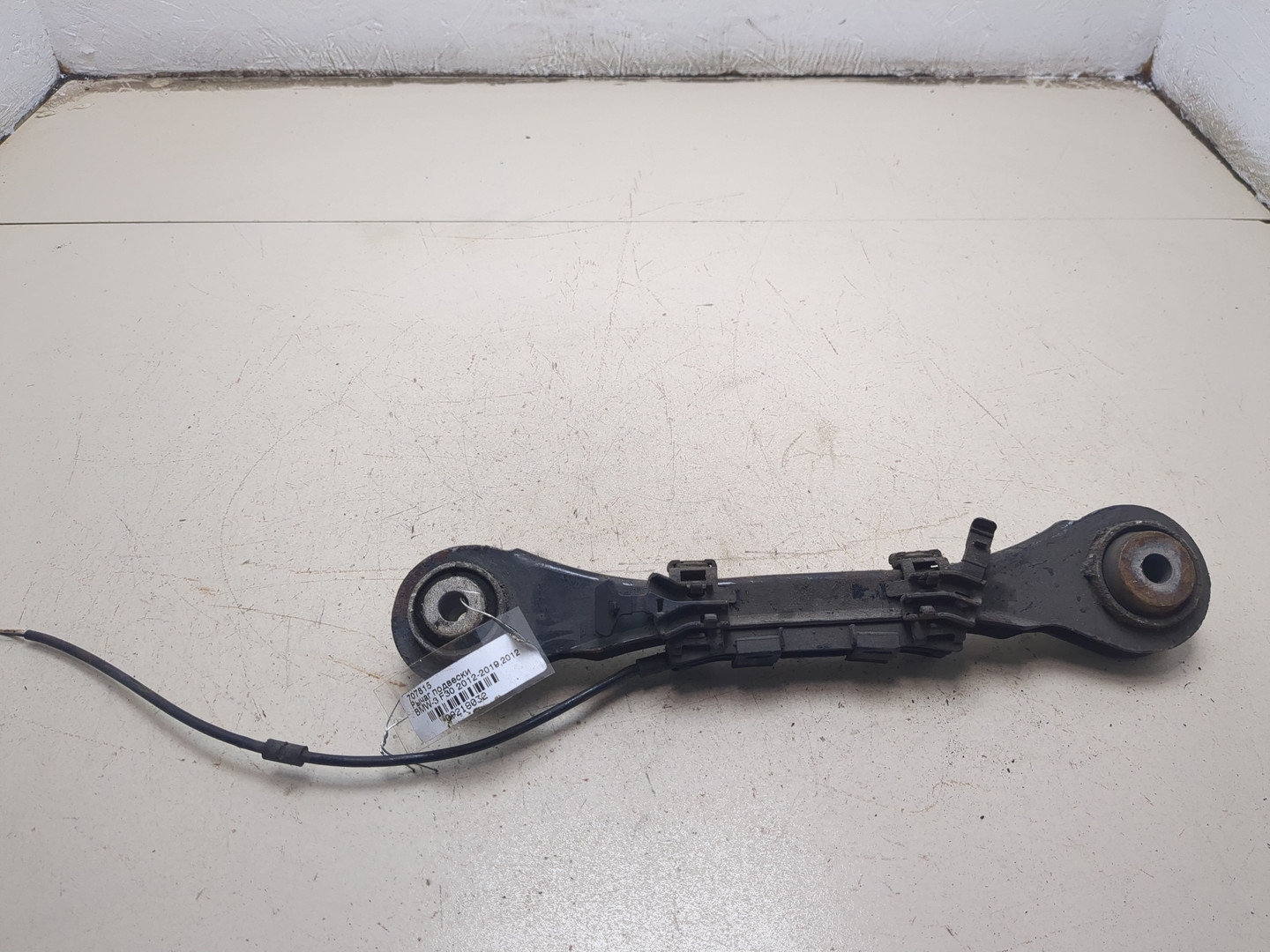 Рычаг задний левый