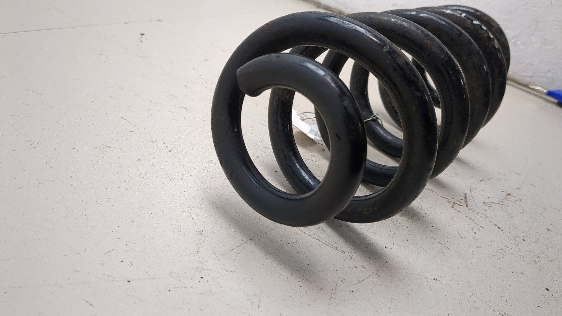 Пружина задняя